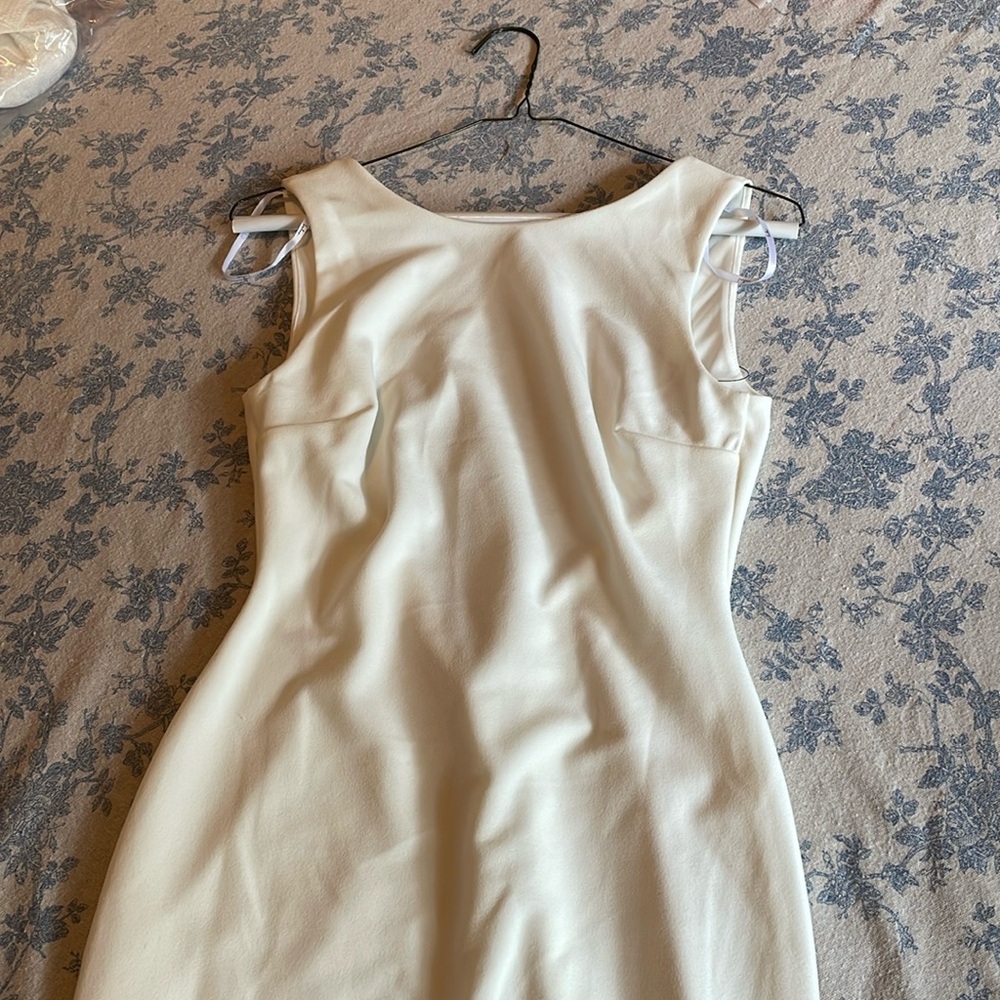 White bod con dress
